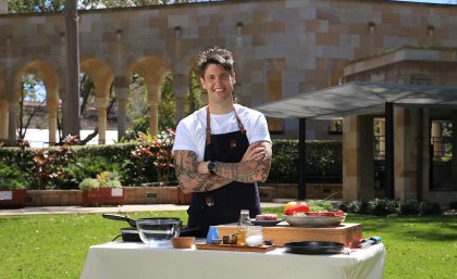 Ben Milbourne filming in The University of Queensland Great Court